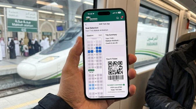 Smartphone displaying HHR Train App seat selection and QR e-ticket confirmation.